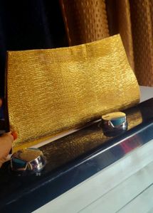 Elegant Gold Embellished Clutch Bag