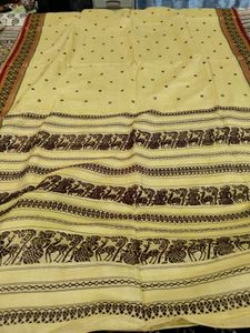 Elegant Yellow Saree with Intricate Motifs