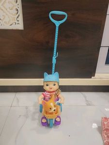 baby alive doll with bicycle