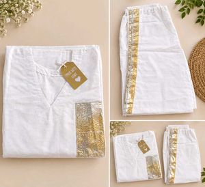 Elegant White Kurta Set with Gold Accents