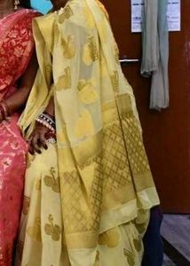Elegant Yellow Saree with Intricate Motifs