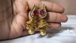 Elegant Gold Jhumka Earrings with Pearls