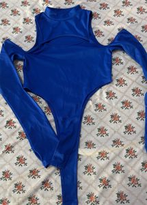 Stylish Blue Cut-out Top with Black Pants