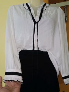 Classic White Blouse with Black Accents