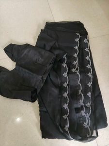 Elegant Black Saree with Scalloped Border