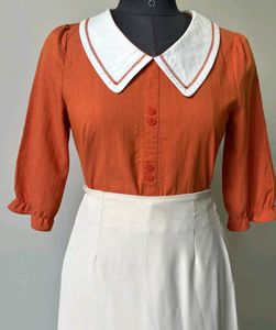 Retro Orange Top with White Pan Collar