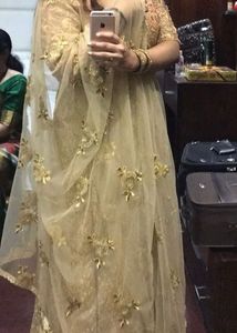 Stunning Golden Lehenga with Intricate Embellishme