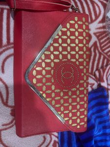 Red Sling Bag With CHANEL Logo