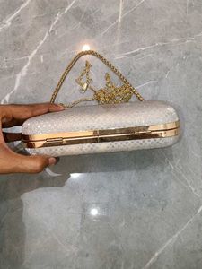 Elegant Silver Clutch with Chain Strap