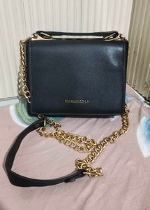 Chic Black Crossbody Bag with Gold Chain