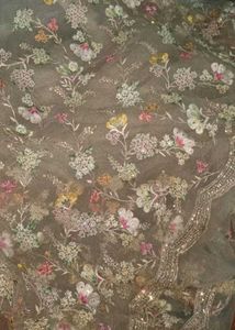 Embellished ivory net saree for engagement