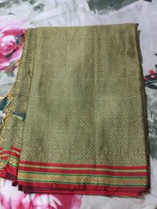 Beautiful Green khan Saree with Red Border