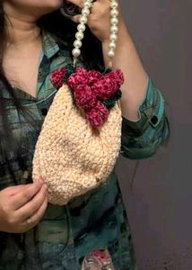 Unique Beaded Handle Clutch with Floral Accent