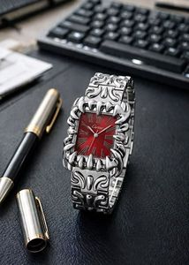 Silver Tone Watch with Intricate Design