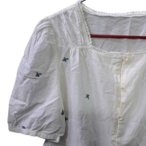 White Embroidered Peplum Top