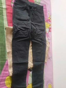 Stylish Black Jeans and cream vest