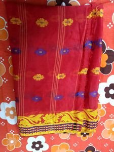 Vibrant Red Saree with Floral Motifs