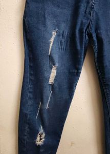Ripped Blue Denim Jeans