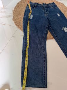 Distressed Blue Denim Jeans