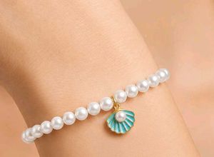 Elegant Pearl Bracelet with Shell Charm