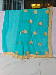 Beautiful Blue Saree with Gold Border