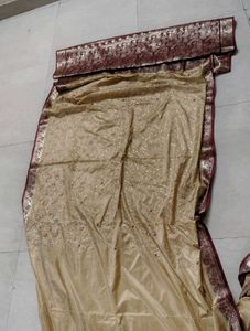 Elegant Gold and Maroon Silk saree