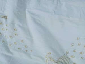 cotton white kurthi with peacock embroidery design