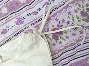 Cream Sleeveless Mini Dress with pockets