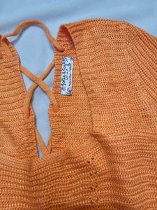 Orange knitted cropped top