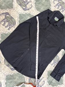 Combo of Black shirt and blue jeans