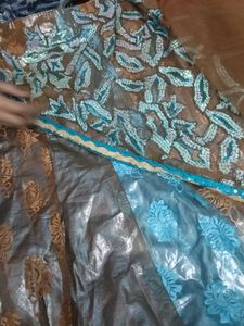 brown  blue saree with golden and silver pri