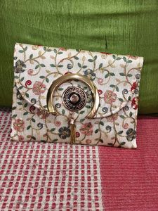 Embroidered Clutch Bag with Tassel