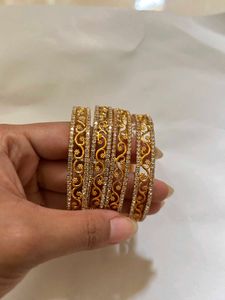 Elegant Gold Tone Bangle Set