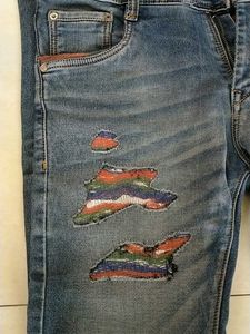 Distressed Patchwork Denim Jeans