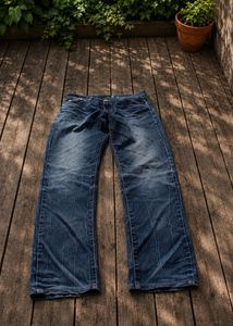 Distressed Blue Denim Jeans