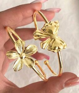 Chic Gold-Tone Flower & Bow Bangles