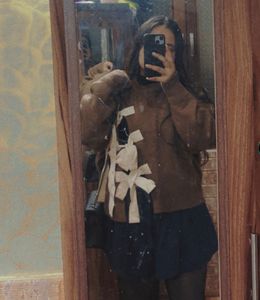 Stylish Brown sweater with Bow Details