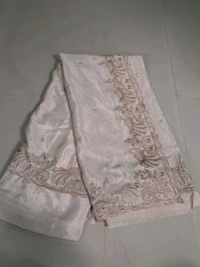 Elegant Cream Saree with Peacock Embroidery