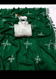 Elegant Green Silk Saree with Pearl Necklace