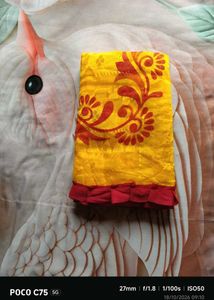 Vibrant Yellow Saree with Red Border