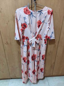 Pleated floral dress with front tie up