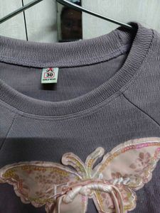 Like new top purple butterfly design