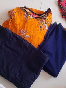 like New  Orange Kurta with Navy Blue Bottoms and