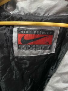 nike lightweight silver jacket