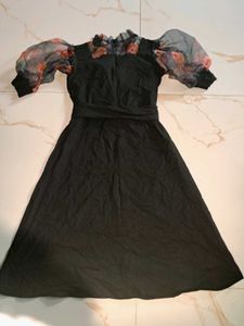 Elegant Black Dress with Floral Sleeves