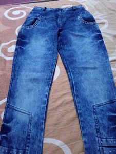Stylish Blue Wash Jeans with Embellished Details