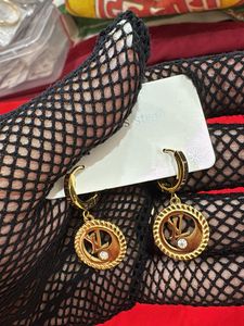 Gold Tone Hoop Earrings with Crystal Accent