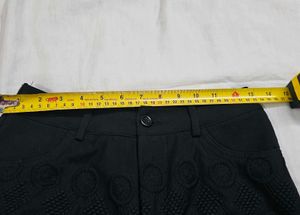 Chic Black Eyelet Shorts with Embellishments