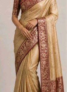 Elegant Gold and Maroon Silk saree