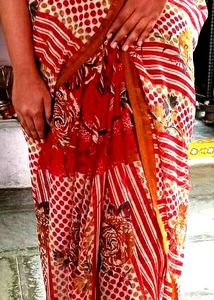 "Crimson Blooms: A Red Floral Print Saree 🌹🌼💃"
